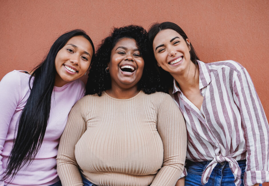 Young latin women smiling in front of camera