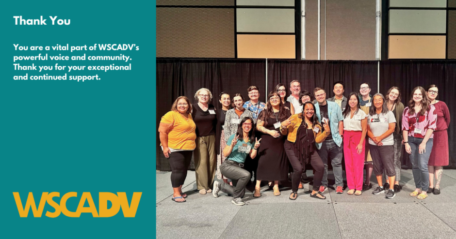 WSCADV staff and interns at the 2023 conference standing together on stage. Image text provided below.