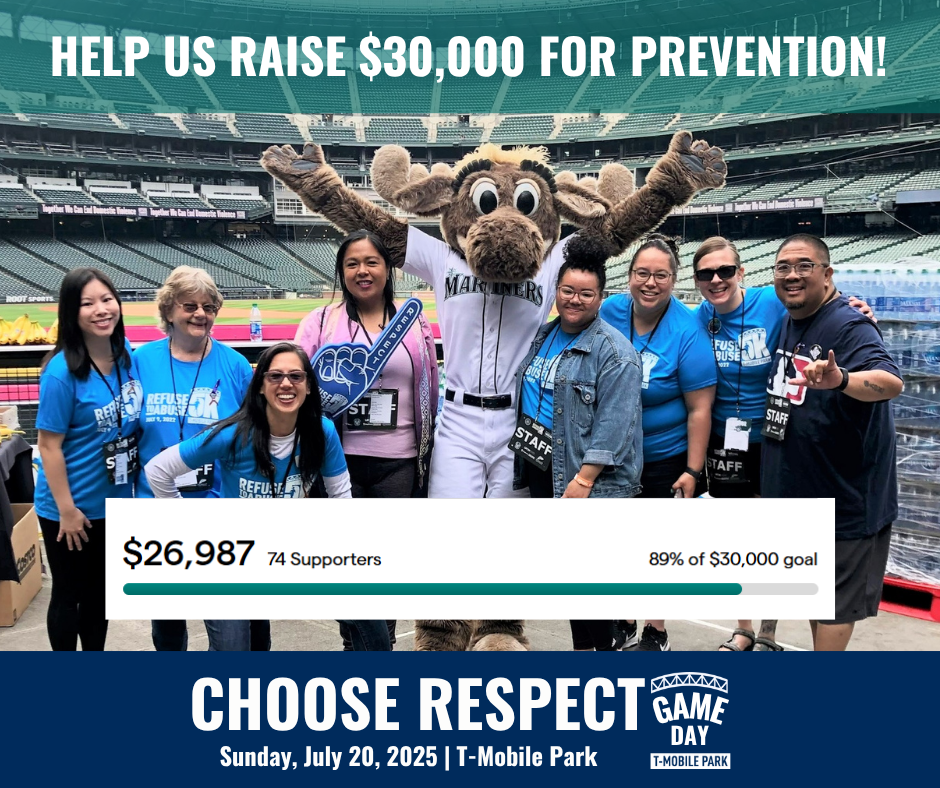 Group of WSCADV staff and board at T-Mobile Park with Mariners Moose mascot. Fundraising at 89% of goal.